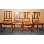 A set of four 1930's oak dining chairs.