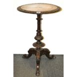 A 19th century carved mahogany pedestal wine table with inlaid walnut veneered top, D. 50cm, H.