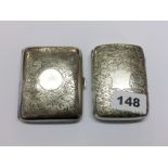 Two engraved hallmarked silver cigarette cases, largest 7 x 9 x 2cm.