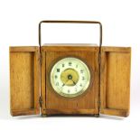 An early 20th century brass and olive wood carriage clock, H. 12cm.