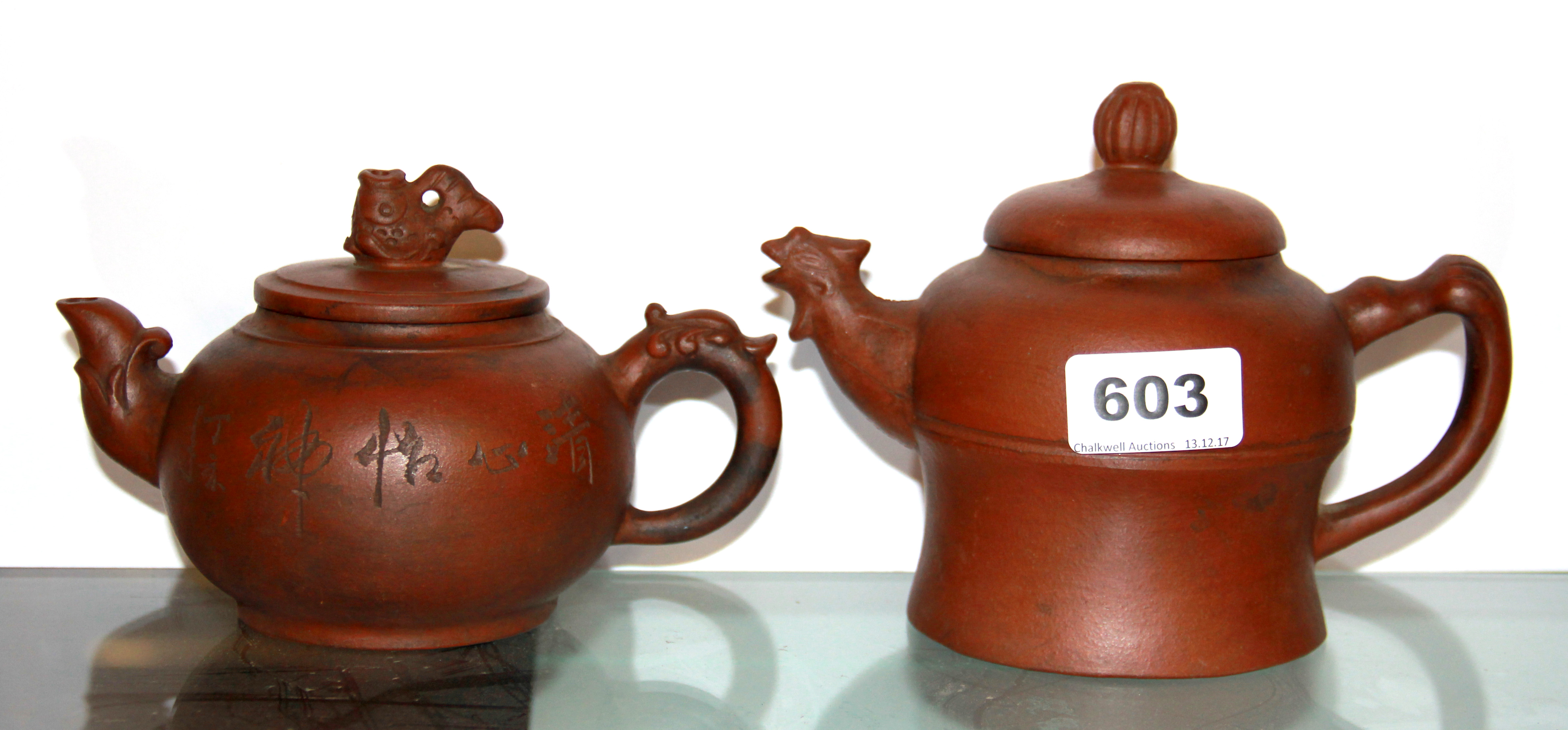 Two Chinese Yixing terracotta teapots, H. 10 & 12.5cm.