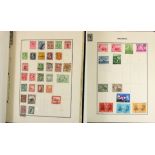 Two albums of world stamps.