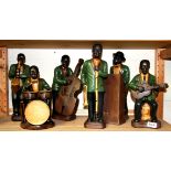 A group of five ceramic musician figures, tallest H. 35cm.