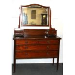 An Edwardian inlaid mahogany dressing table, W. 105cm, H. 152cm.