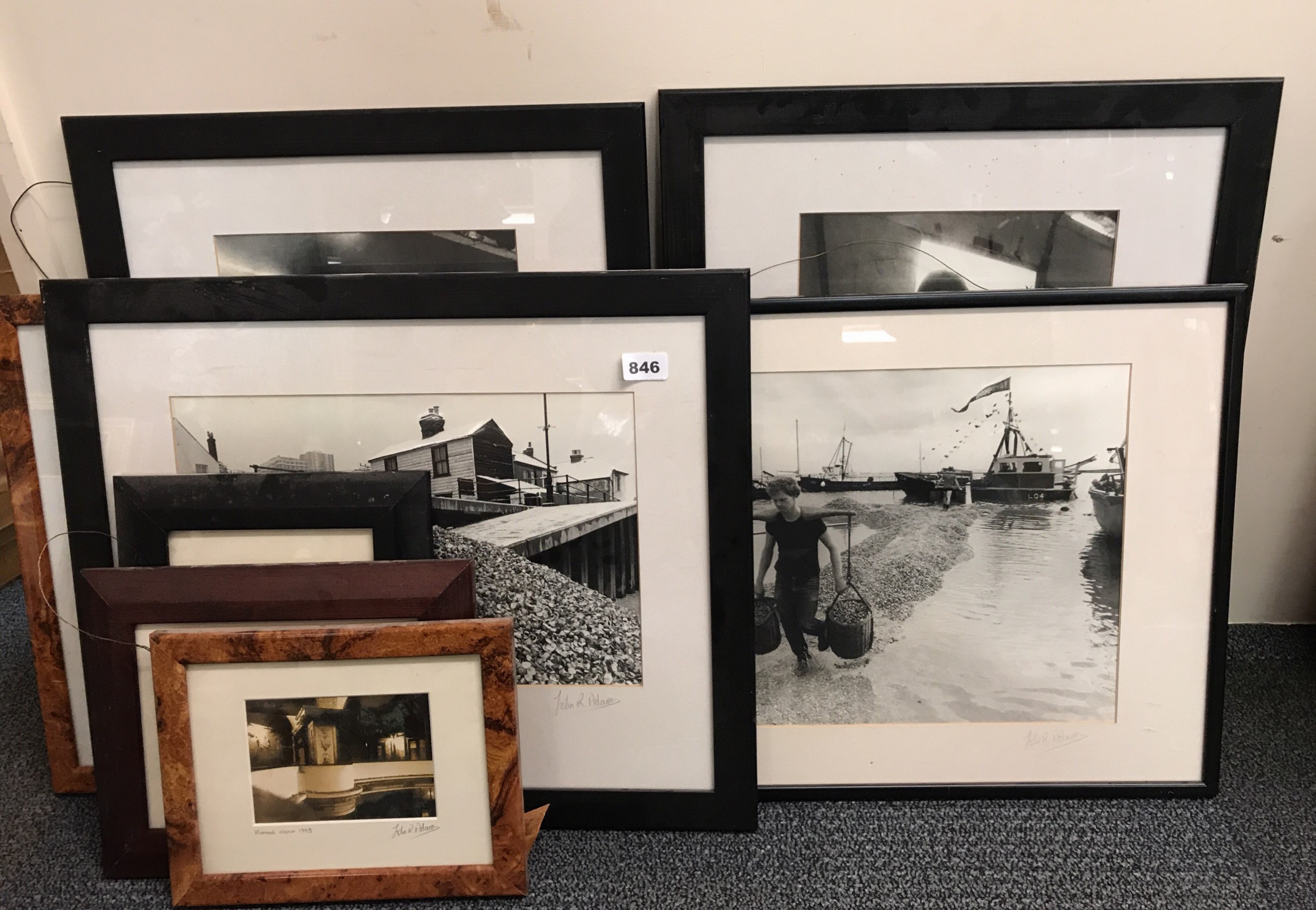 Eight framed photographs, pencil signed by John R Adams of Leigh on sea scenes.