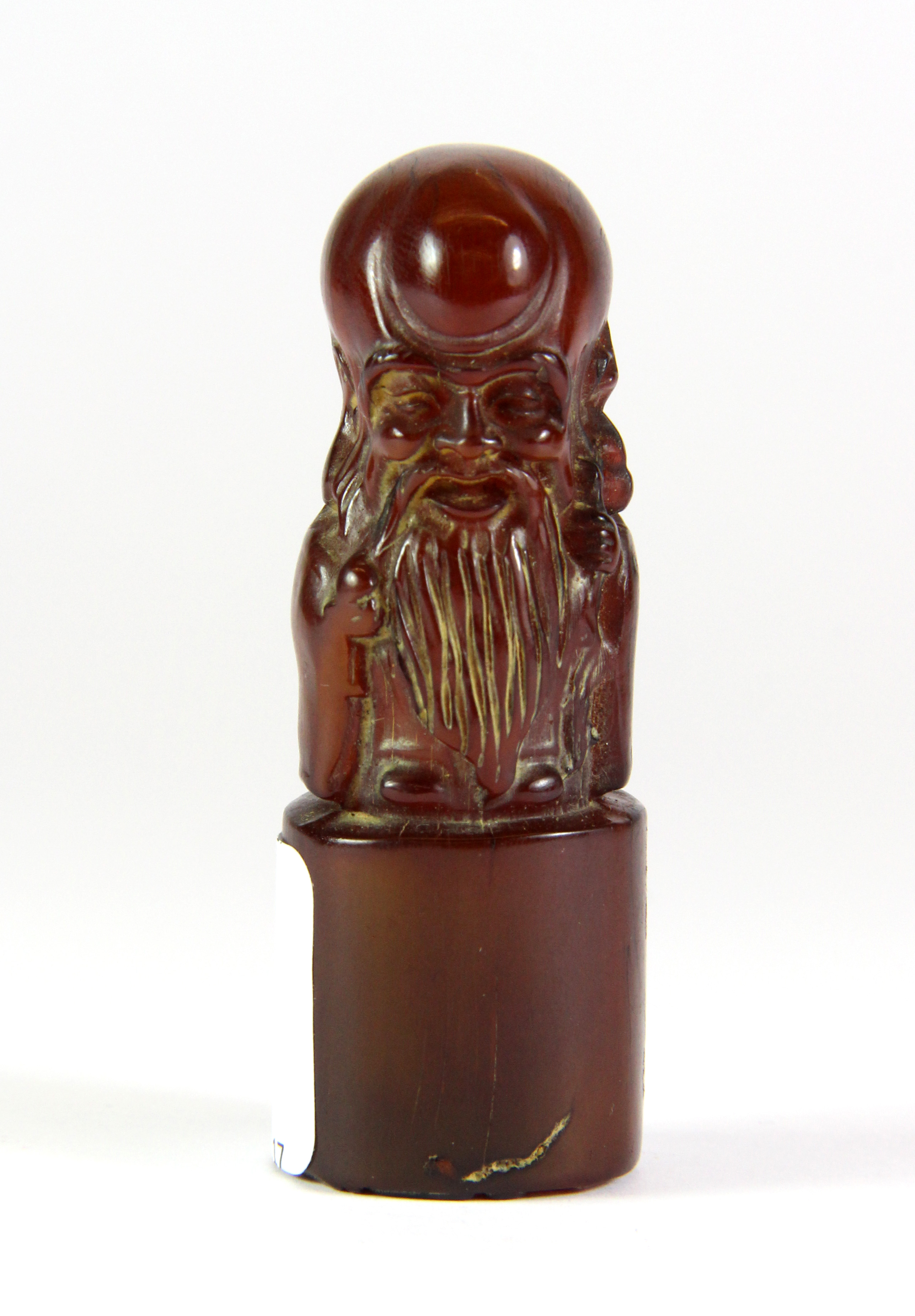 A carved Chinese horn seal, H. 6.5cm.