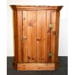 A small pine corner cabinet, H. 64cm.