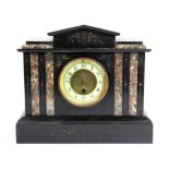 A 19th century French slate and marble mantle clock, H. 29cm.