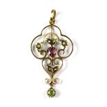 Suffragette interest. An Edwardian 9ct yellow gold pendant set with amethyst, peridot and seed