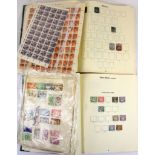 Two albums of world stamps with a quantity of stamped sheets of stamps, etc.