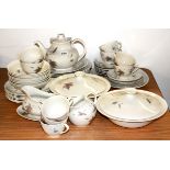 An extensive Royal Doulton "Tumbling Leaves" pattern dinner and tea set.