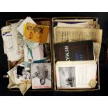 A vintage case and photographic and ephemera contents.