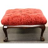 A 1920's ball and claw foot upholstered stool, 62 x 62 x 32cm.