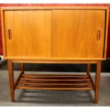 A 1970's teak record cabinet, 71 x 40 x 76cm.