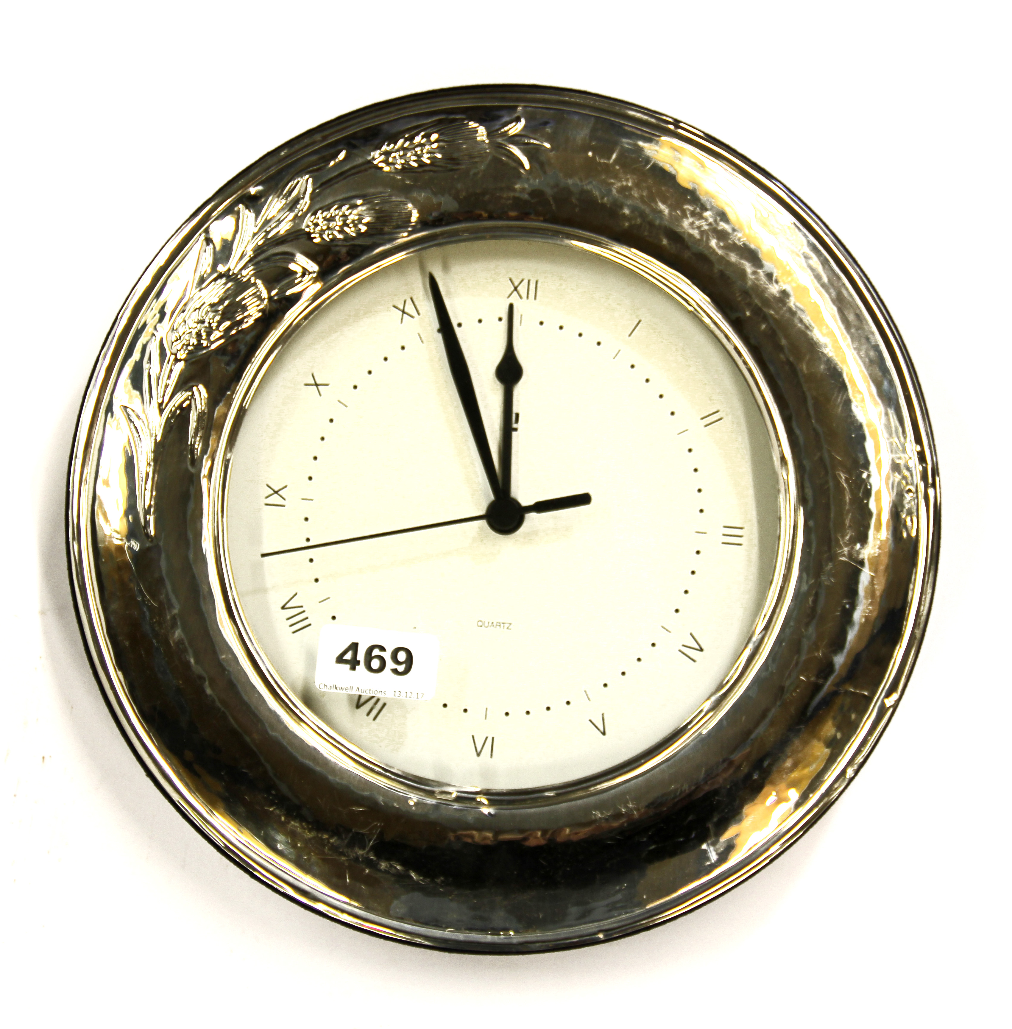 A contemporary silver framed wall clock, Dia. 28cm.