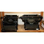 Two early typewriters.