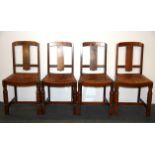 A set of four 1930's oak dining chairs.