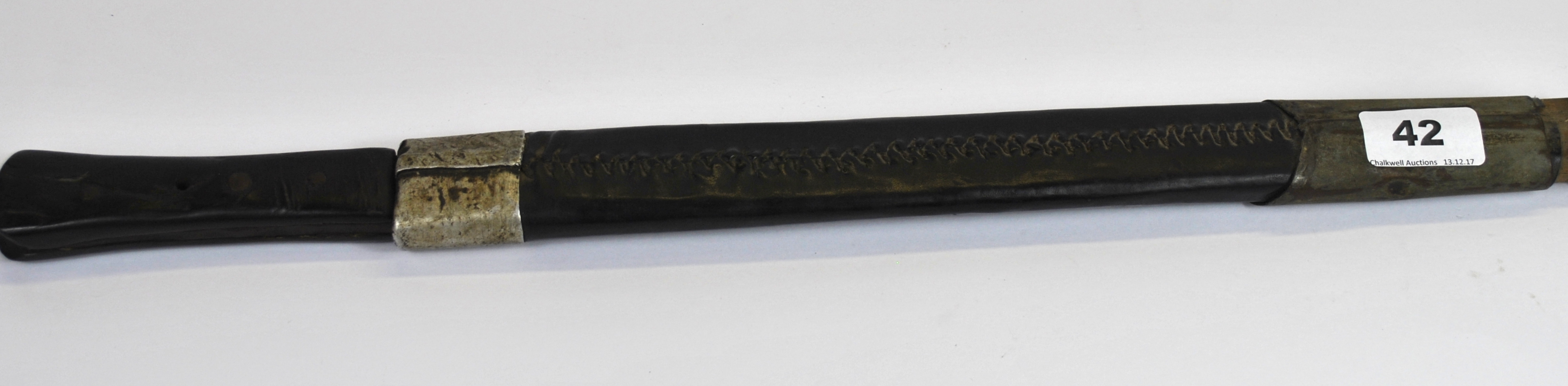 A 19th / early 20th century Tibetan short sword, L. 50cm.