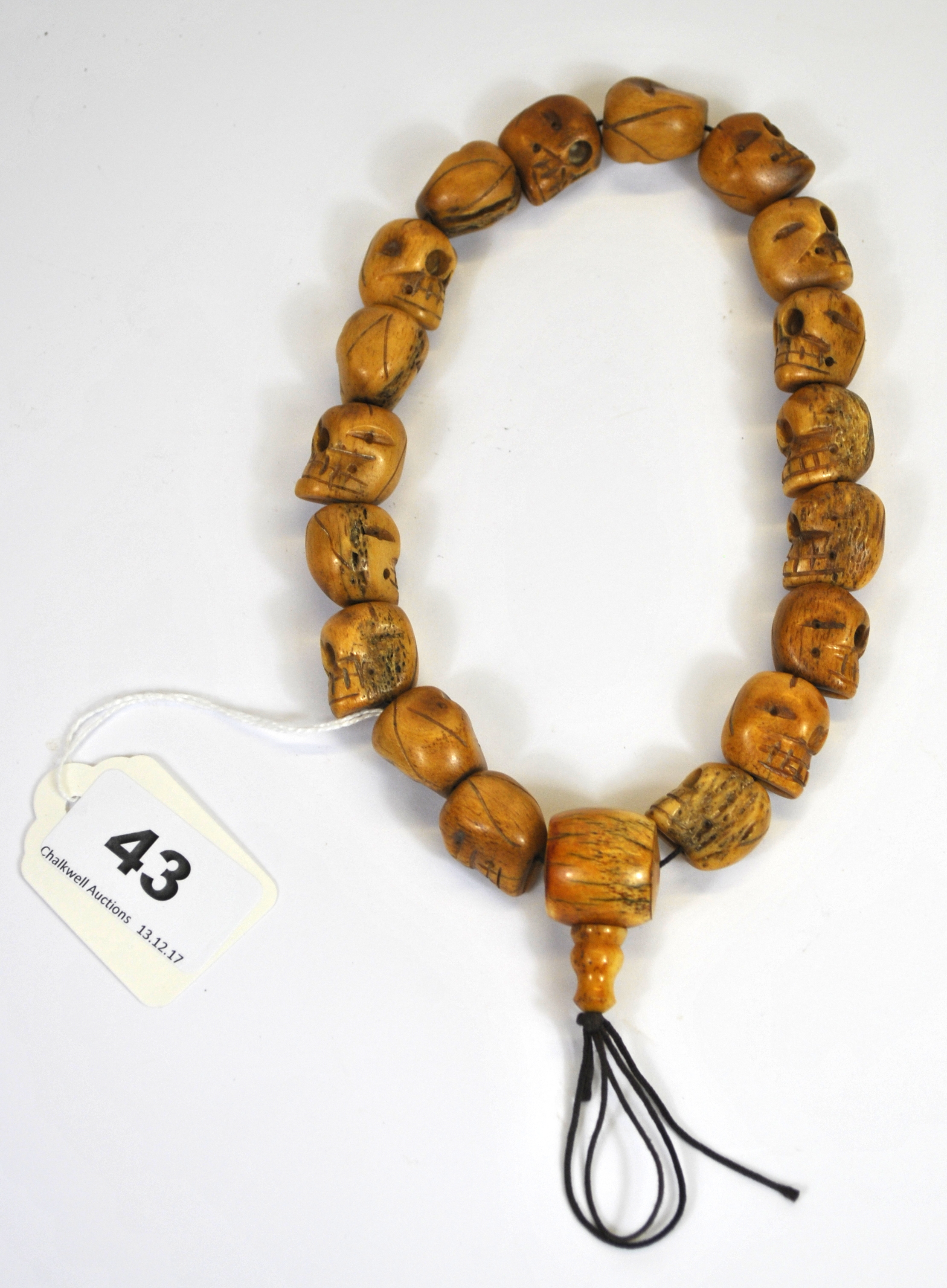 An interesting strand of Tibetan carved bone skull prayer beads, 1.5 x 2cm. - Image 2 of 2