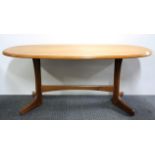 A 1970's teak coffee table, W. 108cm.