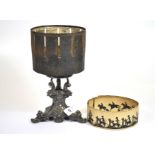 A Zoetrope on an ornate silver plated stand with two cards, H. 24cm.