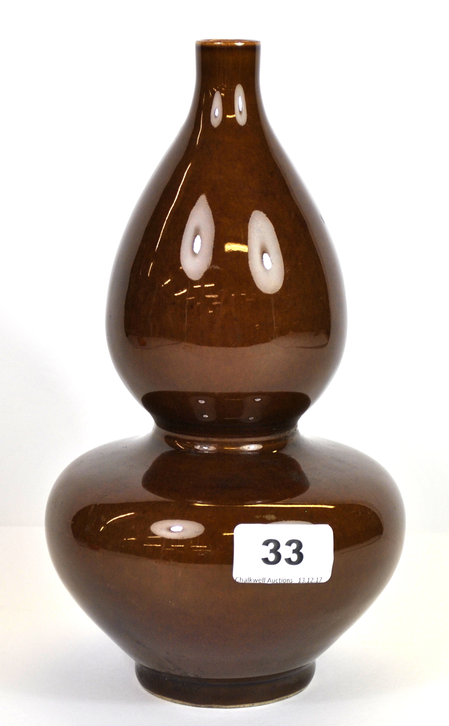 A 19th century Chinese brown glazed gourd shaped porcelain vase, six character mark to base, H. - Image 2 of 3