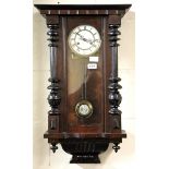 An early 20th century French wall clock, H. 70cm.