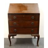 A 1930's mahogany bureau.