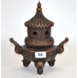 A good quality Chinese cast bronze pagoda censer with elephant head handles and feet, H. 26cm.