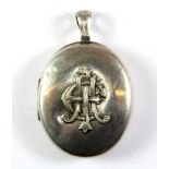 A large Victorian sterling silver locket pendant H.6cms.