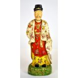 An 18th century Chinese style continental porcelain figure in famille rose colours, H. 25cm, (A/F).