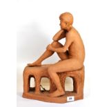 A well sculpted terracotta figure of a naked male, H. 42cm.