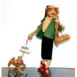 An amusing 1950's felt and wirework figure of a lady walking a dog, H. 24cm.