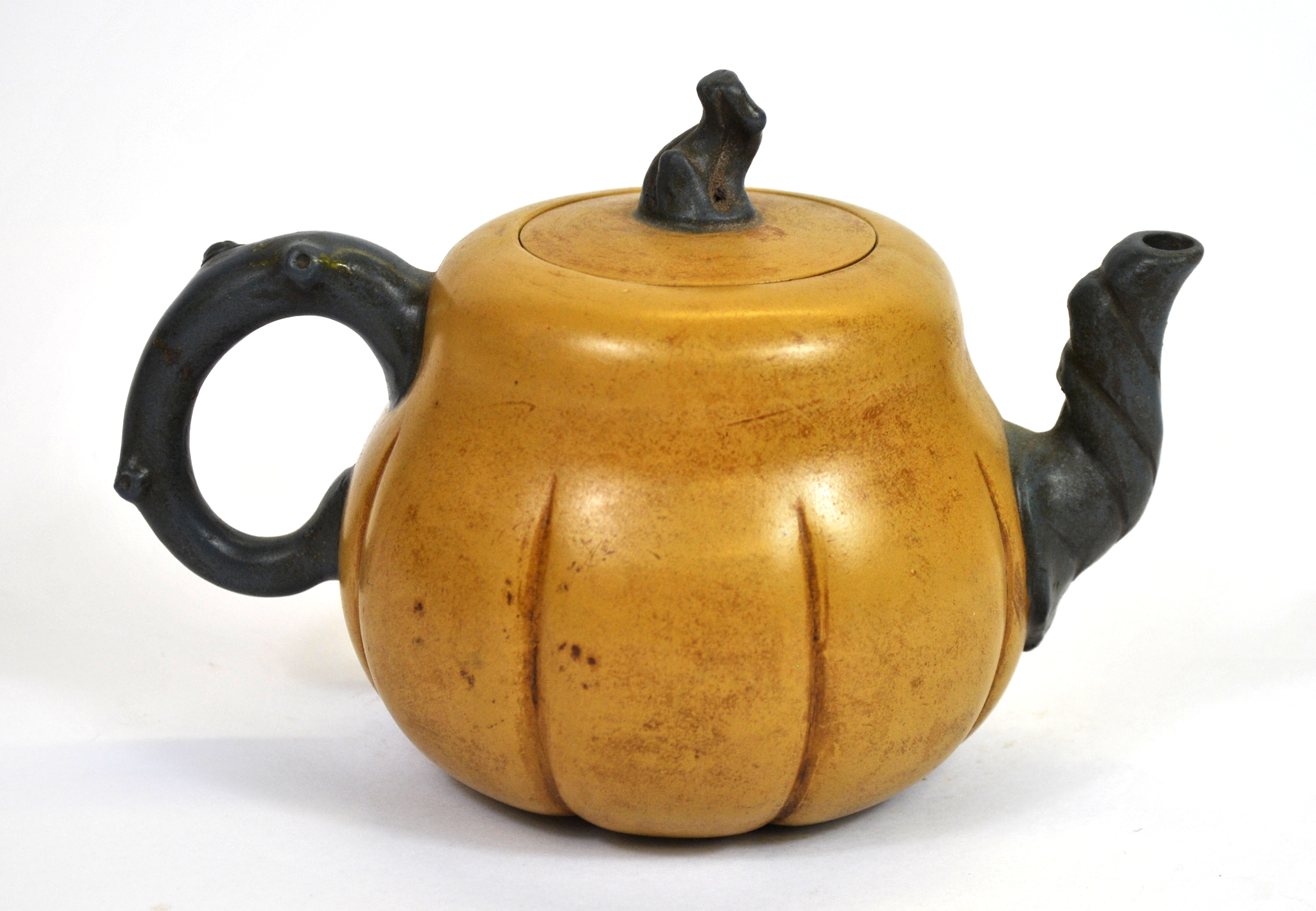 A Chinese two colour hand made Yixing terracotta tea pot, W. 19cm. - Image 2 of 3