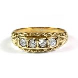 A 9ct yellow gold stone set ring, (M).