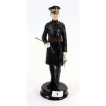 A Michael Sutty limited edition porcelain figure (no. 45) of a soldier in the Scots Guard, H. 30cm.