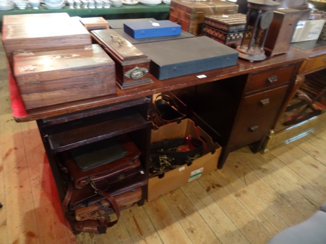 A large early 20th century mahogany partners desk (154cm x 91cm).