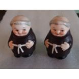 A pair of Goebel ceramic peppers, modelled as monks (6cm).