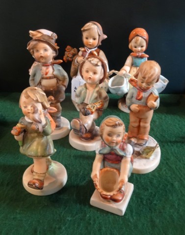 A collection of eight Hummel figurines, to include examples no. 258, 204, 175, 300 and others.