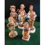 A collection of eight Hummel figurines, to include examples no. 258, 204, 175, 300 and others.