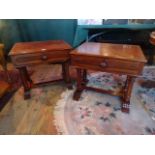 A pair of mahogany single drawer side tables (63cm wide x 57cm tall).