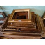 A collection of eight gilt composite picture frames (the largest 67cm x 45cm).