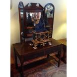 A late Victorian two drawer dressing table,