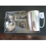 A silver brandy ladle, together with an American sterling silver strainer,