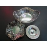 Two items of contemporary silver, to include: an open pierced dish and a circular pin dish,