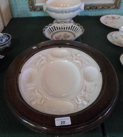 A large white glazed oval dish, 19th century, possibly by Minton, (egg & spinach),