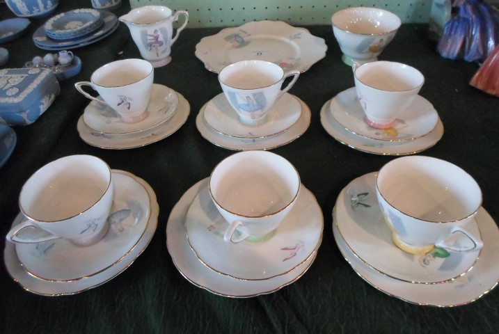 A Royal Stafford Ballet pattern part-tea service, comprising eight trios, sandwich plate,