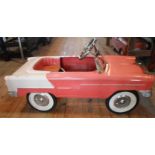 A late 20th century child's pedal car, modelled as a 1950's Chevrolet,