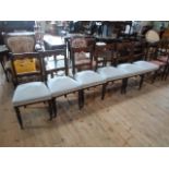 A set of six Edwardian mahogany dining chairs,