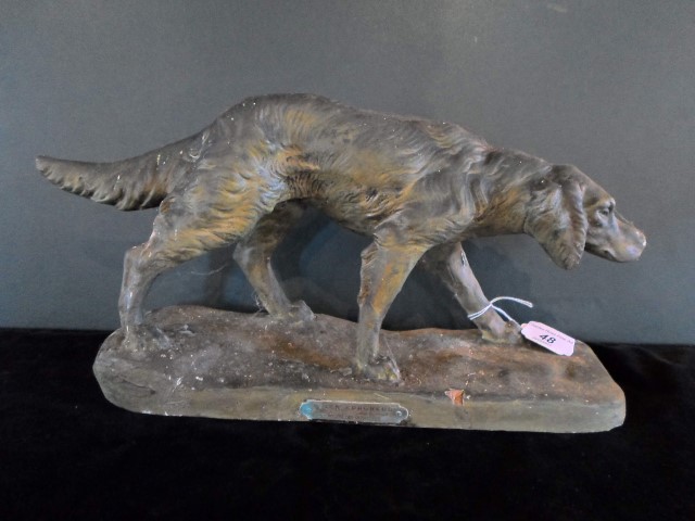 An early 20th century painted terracotta model of a dog, after E.